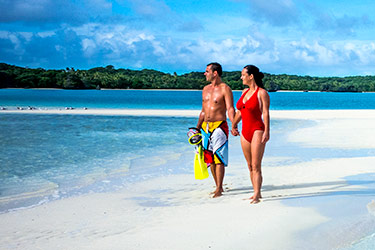 Couple on secluded beach, Fiji