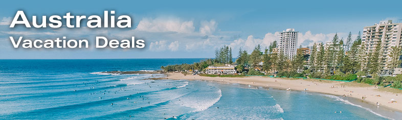 Surfers exploring shoreline, Australia